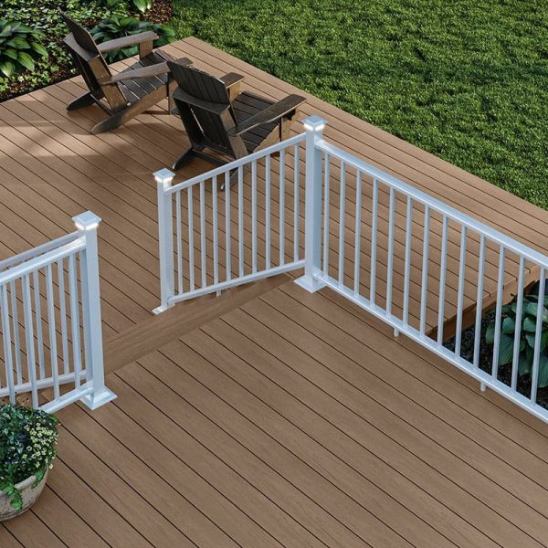 light brown deck with white railing