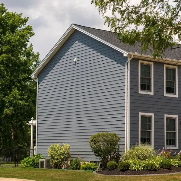 Blue siding with Green trees
